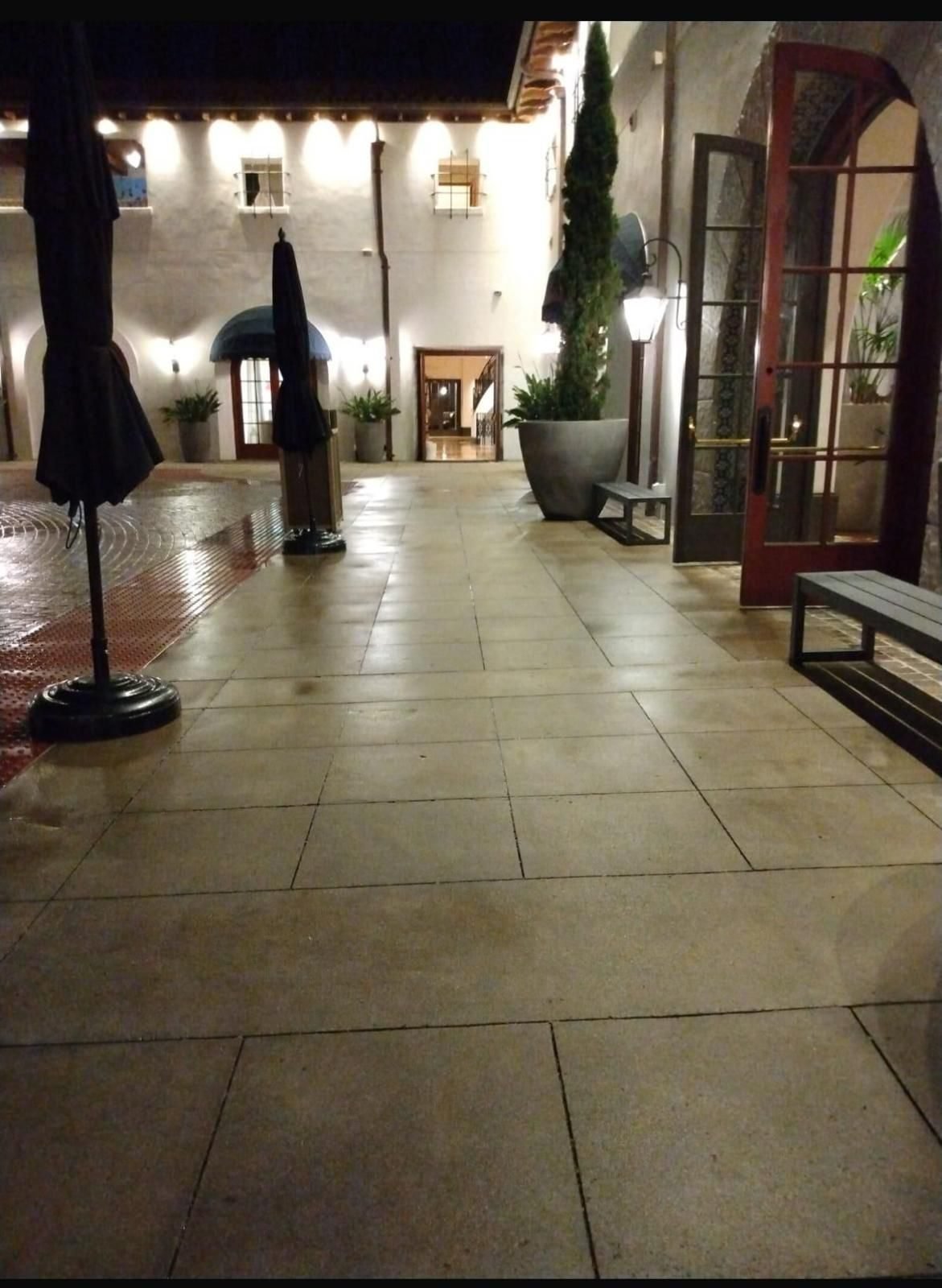 Long hospitality corridor with a freshly buffed floor