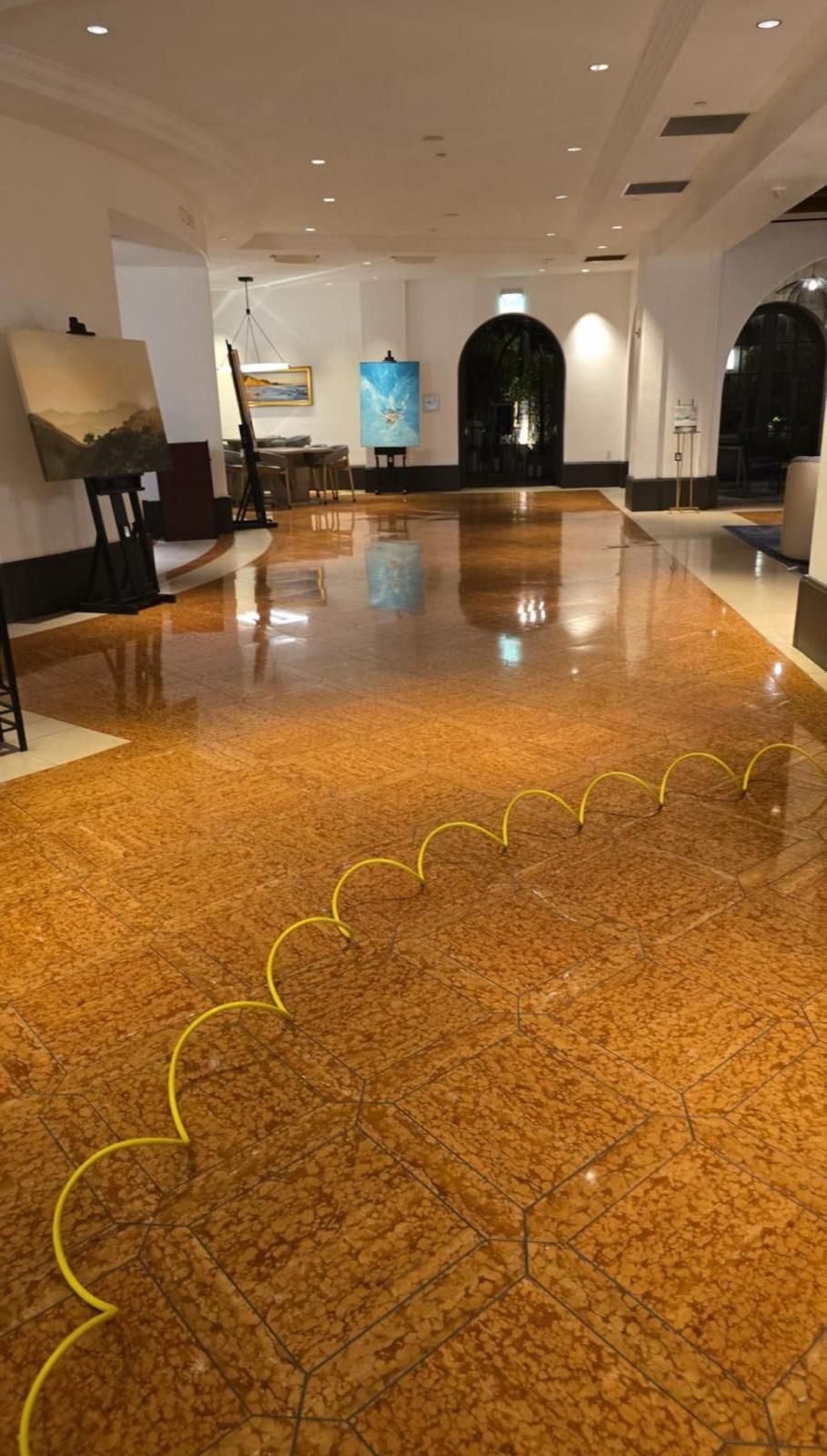 Hotel lobby floor cleaned to a mirror finish